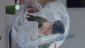 4k footage of executives discussing at desk in office with data processing animation over globe. - Powered by Shutterstock - Get 15% off with code: PIKWIZARD15