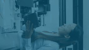 Animation of graphs with numbers over diverse female coworkers discussing reports in office. Digital composite, multiple exposure, business, planning, teamwork and technology concept. - Powered by Shutterstock - Get 15% off with code: PIKWIZARD15