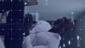 Animation of financial data processing over diverse colleagues discussing work in office. Global business, finances and digital interface concept digitally generated video. - Powered by Shutterstock - Get 15% off with code: PIKWIZARD15