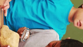 Children learning science in classroom and animation over them. education, exploration, discovery, geology, experiment - Powered by Shutterstock - Get 15% off with code: PIKWIZARD15