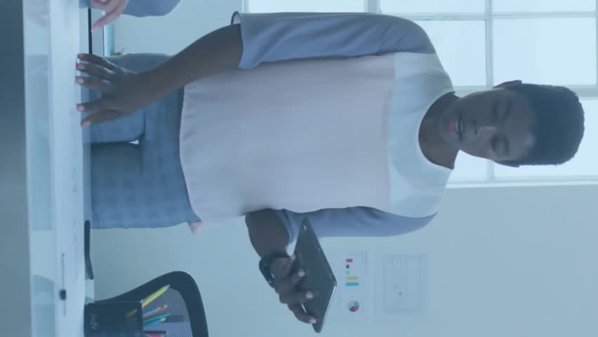 Analyzing data and discussing project, business colleagues with digital interface animation. analysis, discussion, teamwork, technology, collaboration, meeting - Powered by Shutterstock - Get 15% off with code: PIKWIZARD15