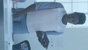 Analyzing data and discussing project, business colleagues with digital interface animation. analysis, discussion, teamwork, technology, collaboration, meeting - Powered by Shutterstock - Get 15% off with code: PIKWIZARD15