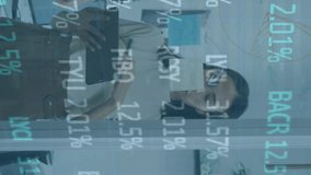 Animation of trading board, infographic interface, diverse coworkers sharing ideas on digital tablet. Digital composite, multiple exposure, stock market, business, teamwork, communication, technology. - Powered by Shutterstock - Get 15% off with code: PIKWIZARD15