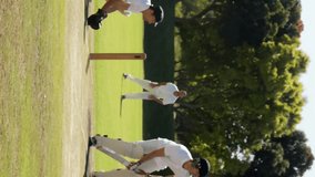 Animation of digital data processing over diverse cricketers on field. Global sports, social media, connections, computing and data processing concept digitally generated video. - Powered by Shutterstock - Get 15% off with code: PIKWIZARD15