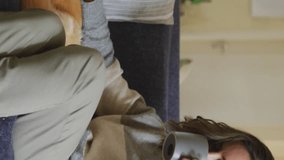 Animation of social media icons and numbers over caucasian woman with pet dog at home. Global social media, data processing and digital interface concept digitally generated video. - Powered by Shutterstock - Get 15% off with code: PIKWIZARD15