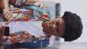 Animation of social media data processing over african american man using smartphone in city. Global computing, digital interface and data processing concept digitally generated video. - Powered by Shutterstock - Get 15% off with code: PIKWIZARD15