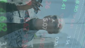 Animation of multicolored trading board over smiling woman talking on speaker of cellphone. Digital composite, multiple exposure, business, stock market and technology concept. - Powered by Shutterstock - Get 15% off with code: PIKWIZARD15