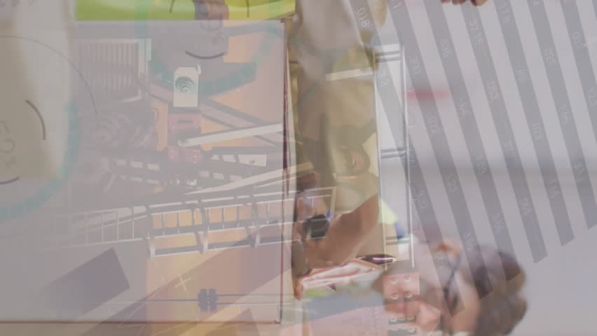 Animation of financial data processing over diverse workers in warehouse. Global finances, delivery, shipping and digital interface concept digitally generated video. - Powered by Shutterstock - Get 15% off with code: PIKWIZARD15