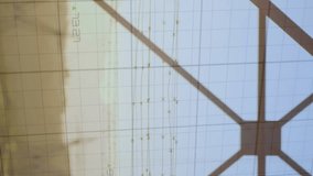 Animation of statistics and data processing with red lines over electricity pylon and landscape. global energy, electricity and data processing concept digitally generated video. - Powered by Shutterstock - Get 15% off with code: PIKWIZARD15