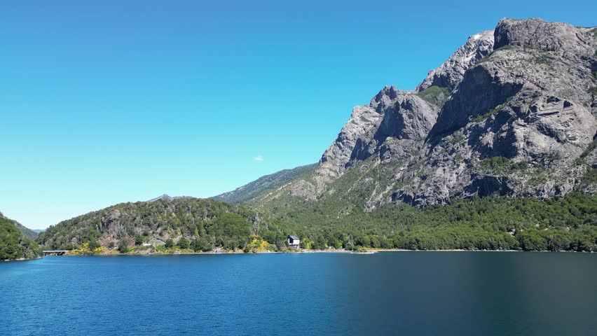 San Carlos de Bariloche, Río Negro, Argentina – October 28, 2024: Aerial footage of Nahuel Huapi Lake captured from the eastern shoreline near Bariloche.