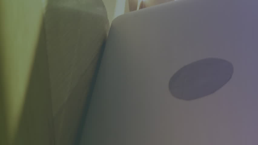 Animation of numbers and letters over caucasian woman using laptop. Global business, data processing and digital interface concept digitally generated video. - Powered by Shutterstock - Get 15% off with code: PIKWIZARD15