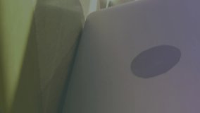 Animation of numbers and letters over caucasian woman using laptop. Global business, data processing and digital interface concept digitally generated video. - Powered by Shutterstock - Get 15% off with code: PIKWIZARD15