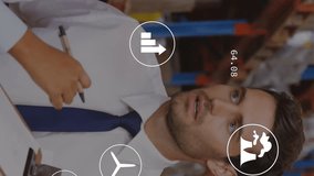 Animation of eco icons and data processing over diverse man and woman working in warehouse. Global shipping, business, finance, computing and data processing concept digitally generated video. - Powered by Shutterstock - Get 15% off with code: PIKWIZARD15