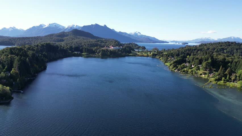San Carlos de Bariloche, Rio Negro, Argentina - October 28, 2024: Aerial footage of Nahuel Huapi Lake captured from the eastern shoreline near Bariloche.