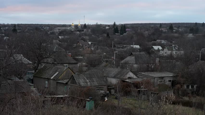 The sun sets on a village near the frontline in the Donbas region of Ukraine. A somber and quiet end to another day in the ongoing war against Russia.