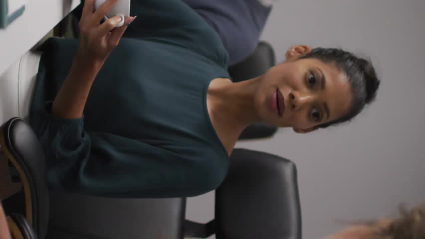 Animation of world map and data processing over diverse male and female colleagues in meeting. Office, teamwork, business, digital interface and communication, digitally generated video. - Powered by Shutterstock - Get 15% off with code: PIKWIZARD15