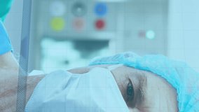 Animation of covid 19 cell over surgeons in face masks. global covid 19 pandemic, medicine and healthcare services concept digitally generated video. - Powered by Shutterstock - Get 15% off with code: PIKWIZARD15