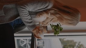 Animation of lines and data processing over caucasian woman using smartphone at cafe. Data processing, communication and technology devices concept digitally generated video. - Powered by Shutterstock - Get 15% off with code: PIKWIZARD15