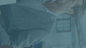 Animation of financial data processing and statistics over business people. Global business, finance, data processing and connections concept digitally generated video. - Powered by Shutterstock - Get 15% off with code: PIKWIZARD15