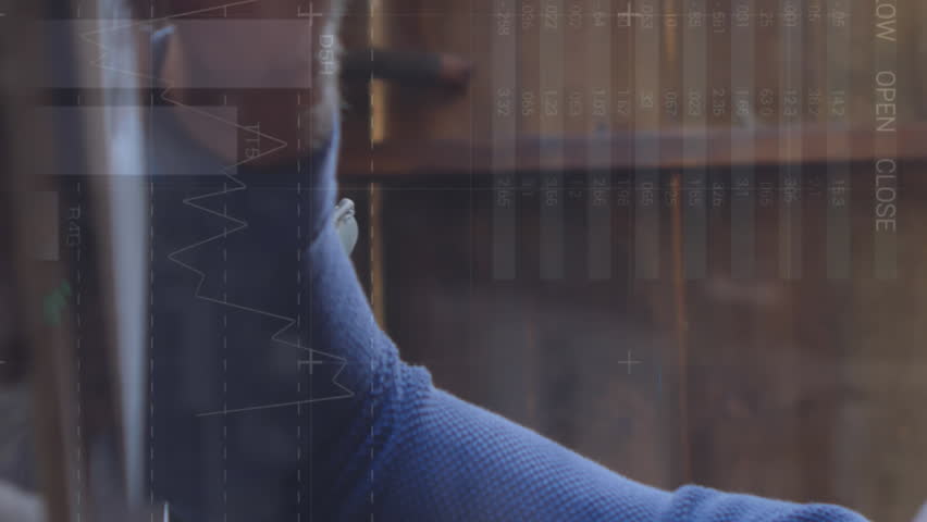 Animation of statistical data processing against thoughtful caucasian man using laptop at home. Computer interface and business data technology concept - Powered by Shutterstock - Get 15% off with code: PIKWIZARD15