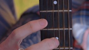 Animation of globe with network of connections and icons over caucasian man playing guitar. Global music, musical instruments, connections and data processing concept digitally generated video. - Powered by Shutterstock - Get 15% off with code: PIKWIZARD15