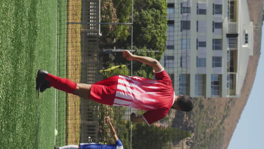 Animation of social media icons over male soccer player dribbling on sports field. Social media networking and sports fitness concept - Powered by Shutterstock - Get 15% off with code: PIKWIZARD15