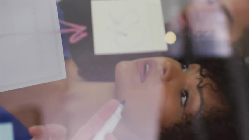 Animation of media icons over diverse colleagues taking notes in office. Global business, teamwork and digital interface concept digitally generated video. - Powered by Shutterstock - Get 15% off with code: PIKWIZARD15