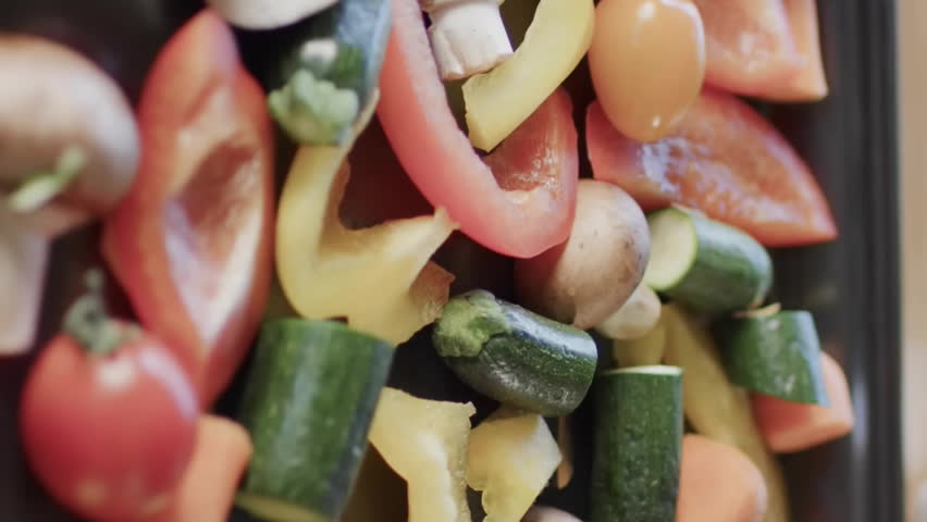 Graphs and charts animating over fresh vegetables on tray. Statistics, analytics, growth, data, healthy, trends