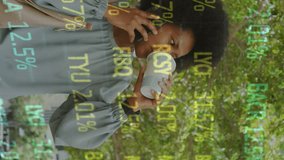 Animation of stock market data moving over african american woman with coffee talking over cellphone. Digital composite, trading, investment, finance, drink, afro hair, speaking, technology. - Powered by Shutterstock - Get 15% off with code: PIKWIZARD15