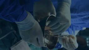 Surgical team collaborating with molecular structure animation in operating room. Surgery, teamwork, innovation, healthcare, medical, technology - Powered by Shutterstock - Get 15% off with code: PIKWIZARD15