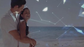 Couple embracing watching nodes forming globe at beach woman pointing exploring global network data. Romantic, connectivity, holography, innovation, exploration, serenity, technology - Powered by Shutterstock - Get 15% off with code: PIKWIZARD15