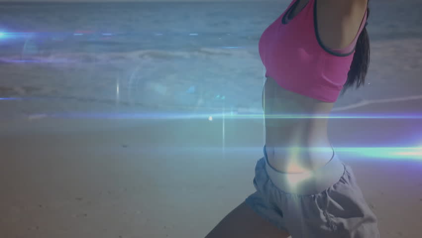 Fitness instructor raising arms on beach, generating pulsing HUD nodes for motion analysis. Outdoor, wellness, exercise, digital, health, vitality, training