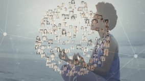 Woman meditating by sea opening palms generating portraits forming sphere dispersing for wellness. Mindfulness, connectivity, serenity, contemplation, spiritual, relaxation, digital - Powered by Shutterstock - Get 15% off with code: PIKWIZARD15