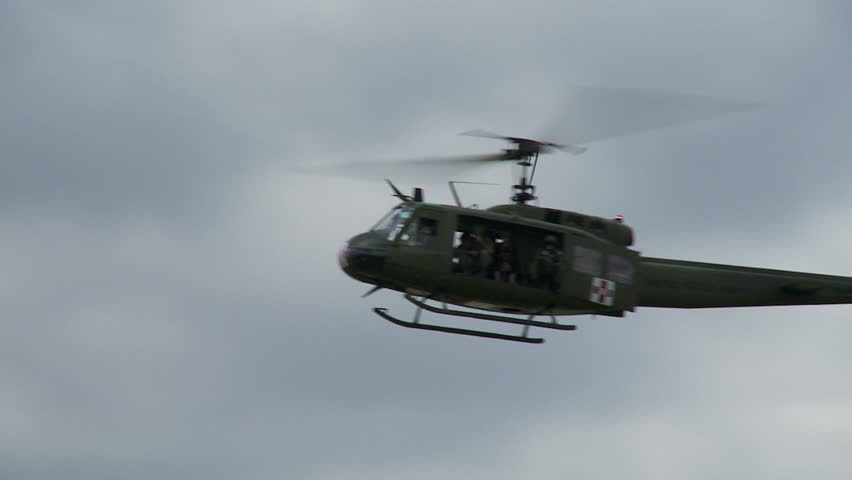 Bell UH-1H Huey helicopter in flight.  Recorded in slow motion at 60fps.