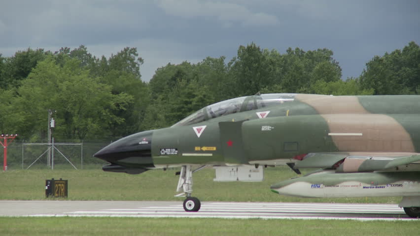 McDonnell Douglas F-4 Phantom jet fighter taking off.