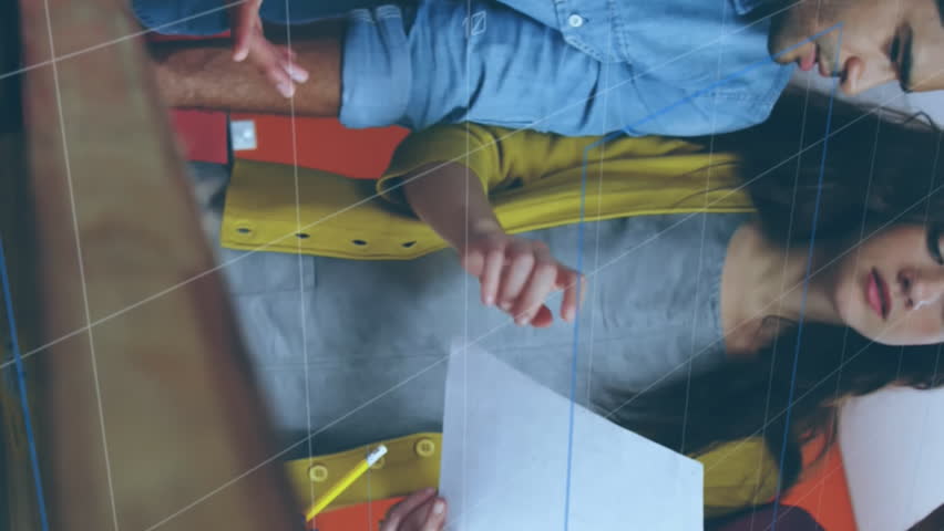 Animation of network of digital icons over group of diverse colleagues discussing over a document. Global networking and business technology concept - Powered by Shutterstock - Get 15% off with code: PIKWIZARD15