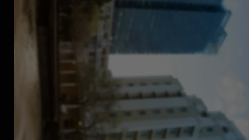 Animation of statistical and stock market data processing against tall building. Global economy and business data technology concept - Powered by Shutterstock - Get 15% off with code: PIKWIZARD15