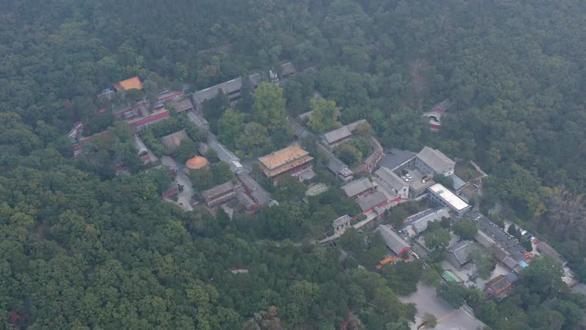 Beijing China-07,08,2025:Burning incense, worshiping Buddha, and praying at Tanzhe Temple
