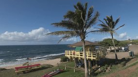 Yellow lifeguard tower on windy famous Ho'okipa windsurfing beach, Maui, Hawaii - Powered by Shutterstock - Get 15% off with code: PIKWIZARD15