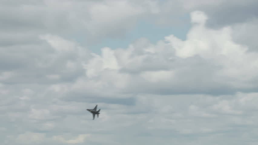 General Dynamics F-16 Fighting Falcon jet fighter flying.