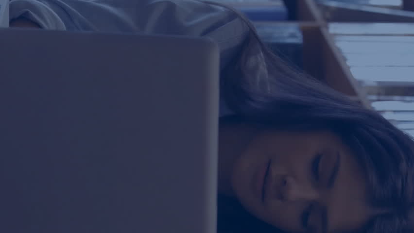 Animation of mathematical equations over caucasian female student using laptop. Education and digital interface concept digitally generated video. - Powered by Shutterstock - Get 15% off with code: PIKWIZARD15