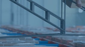 Warehouse worker organizing inventory with data analytics animation overlaid. Logistics, organization, technology, efficiency, supply chain, workforce - Powered by Shutterstock - Get 15% off with code: PIKWIZARD15