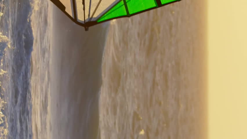 Windsurfer on ocean waves with programming code animation over scene. Windsurfing, sports, technology, coding - Powered by Shutterstock - Get 15% off with code: PIKWIZARD15