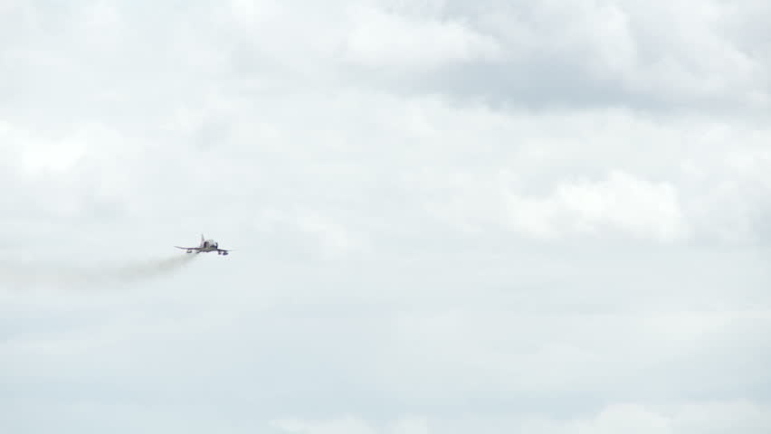 McDonnell Douglas F-4 Phantom jet fighter, performs a sharp bank in flight