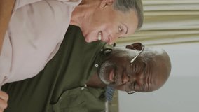 Animation of social media icons and numbers over senior couple at home. Global social media, data processing and digital interface concept digitally generated video. - Powered by Shutterstock - Get 15% off with code: PIKWIZARD15