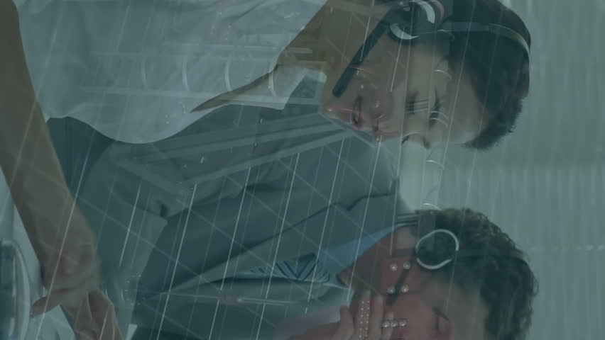 Business professionals working at computers with financial data animation overlay. technology, finance, teamwork, innovation, strategy, data analysis - Powered by Shutterstock - Get 15% off with code: PIKWIZARD15