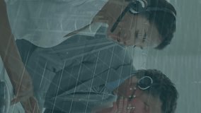 Business professionals working at computers with financial data animation overlay. technology, finance, teamwork, innovation, strategy, data analysis - Powered by Shutterstock - Get 15% off with code: PIKWIZARD15