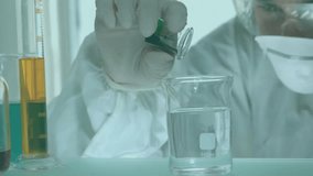 Scientist positioning beaker in lab pouring liquid into solution, with hologram measuring reaction. Researcher, experimentation, futuristic, precision, innovation, analysis, technology - Powered by Shutterstock - Get 15% off with code: PIKWIZARD15
