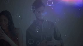 Colleagues scrolling smartphones and revealing technology interface floating nodes lines in office. Futuristic, technology, networking, collaboration, digital, interface, innovation - Powered by Shutterstock - Get 15% off with code: PIKWIZARD15