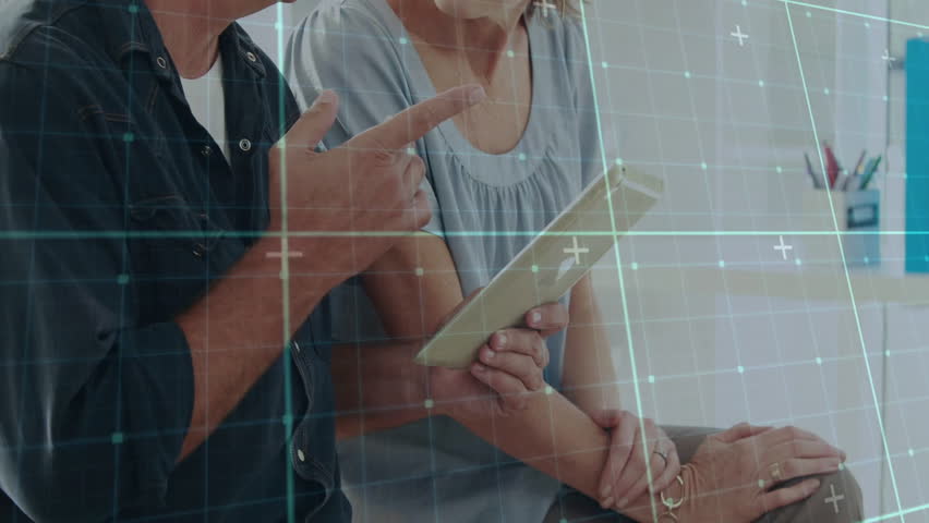 Man pointing tablet screen and guiding woman through chart visuals during business collaboration. Collaboration, teamwork, professionalism, innovation, communication, infographic, strategy